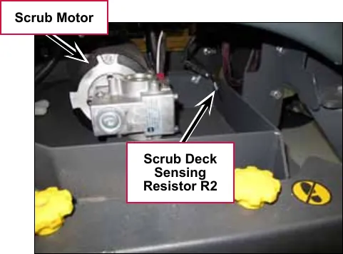 Photo inside the machine with labels: Scrub Motor and Scrub Deck Sensing Resistor R2.