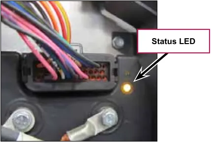Wheel drive controller connector area with the Status LED labeled