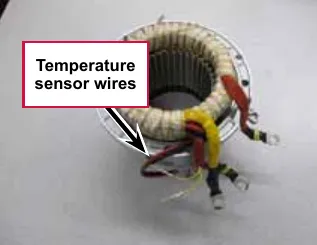 Stator windings with the temperature sensor wires labeled