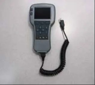 Curtis 1313 hand-held programmer with coiled cable