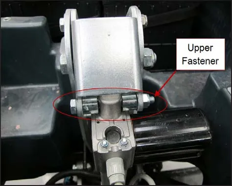 Top of the actuator with the upper fastener circled and labeled Upper Fastener