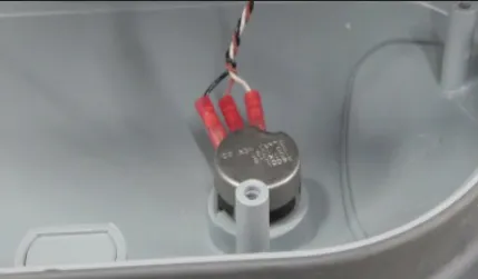 Photo inside the paddle front cover showing the speed limit potentiometer with three red wire terminals attached