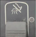 Vacuum toggle switch with a vacuum icon above it and one indicator light beside it