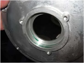Photo of the empty bearing bore in the driver motor.