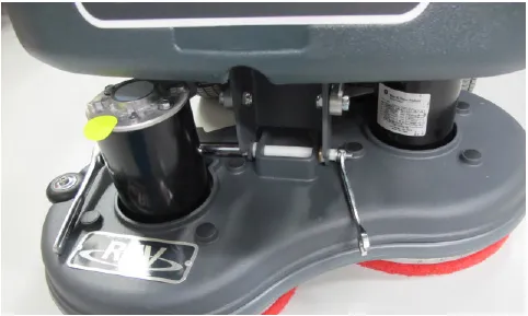 Photo of the REV brush head showing the lift mechanism bracket and through bolt in place.