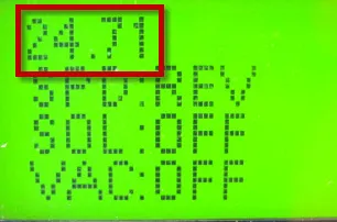 Service test mode LCD with the top line 24.71 (battery voltage) outlined in red, then SPD:REV, SOL:OFF and VAC:OFF