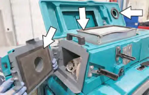 Open live wand vacuum cover with arrows pointing to the dry vacuum seals