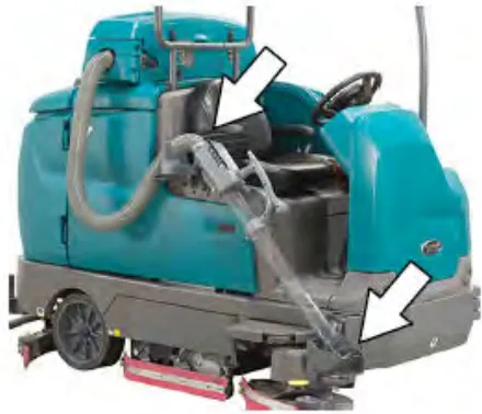 Arrows pointing to the live wand storage location and the ready-to-use position on the machine