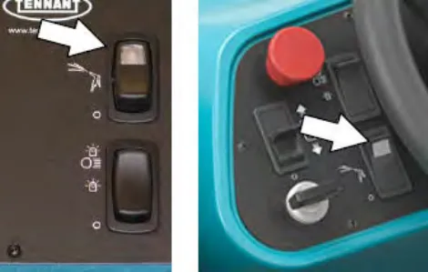 Two switch panels, each with an arrow pointing at the spray nozzle switch