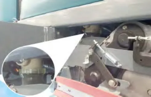Solution supply filter under the scrub head with a magnified inset of the filter screen