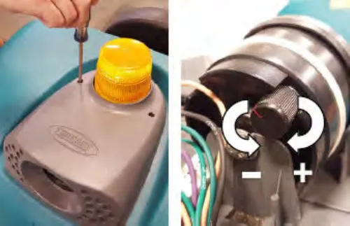 Backup alarm beacon with a screwdriver at the cover, and the volume knob with minus and plus turn directions
