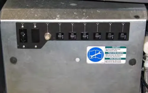 Circuit breaker panel under the operator seat with breakers CB1 to CB9