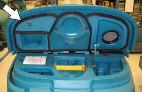 Open recovery tank cover with an arrow pointing to the cover seal