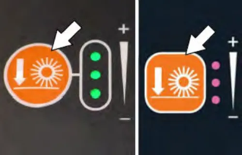 Two standard panel versions of the brush pressure button with an arrow pointing at the button and its indicator lights