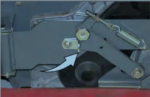 Side squeegee assembly with an arrow pointing at the double scrub latch