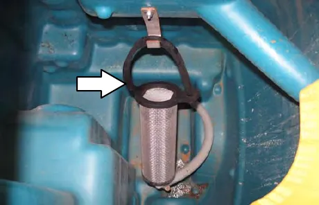 ES filter hanging in the recovery tank, with an arrow to the filter
