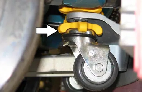 Rear squeegee caster with an arrow pointing to the yellow adjustment knob above it