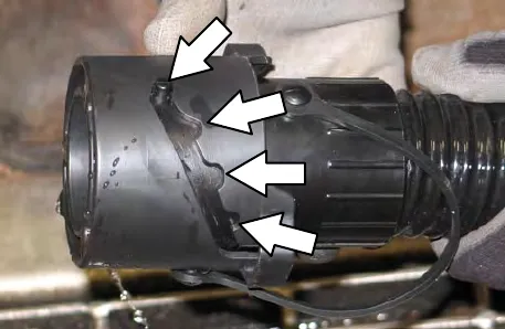 Drain nozzle with arrows to the positions it can be twisted to