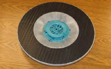 Grip pad driver, with a grip-face backing and a blue centering device