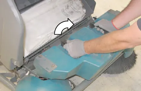 Debris hopper being slid out of the Pre-Sweep assembly