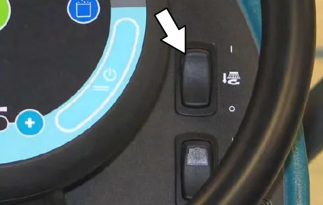 Control panel with an arrow to the side brush switch