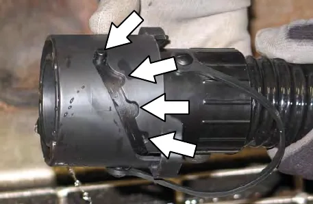 Drain nozzle with arrows to the positions it can be twisted to