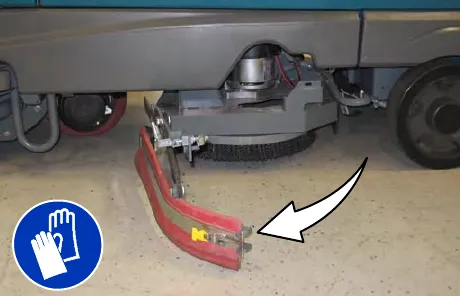 Left side squeegee assembly swung open, with an arrow showing the direction; gloves must be worn