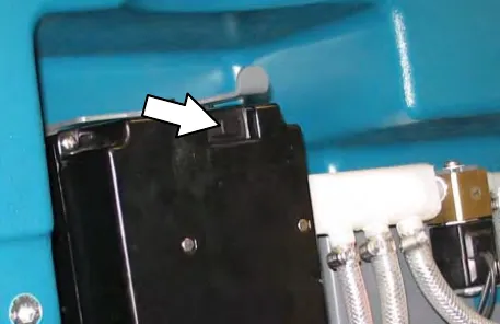 ec-H2O module with an arrow pointing to the flush switch on top