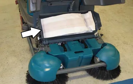 Vacuum debris bag under the Pre-Sweep cover, with an arrow to the bag