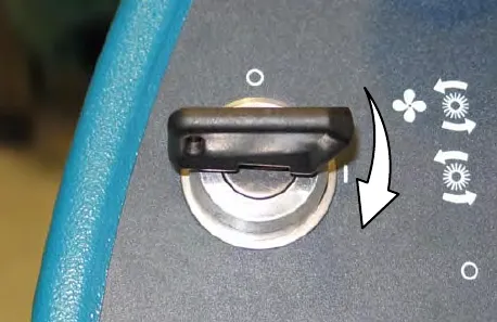 Key switch with an arrow showing the key turned fully clockwise past the on position