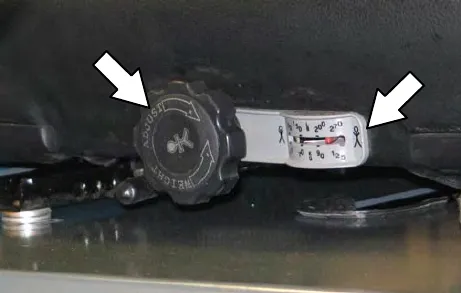 Weight adjustment knob and firmness gauge under the deluxe seat
