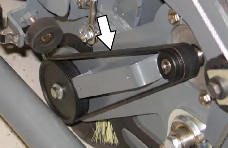 Inside the Pre-Sweep assembly with an arrow pointing to the brush drive belt