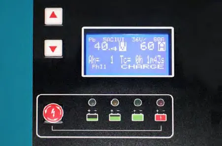 Charger control panel with up and down buttons, the display showing CHARGE, a stop/start button and four status lights