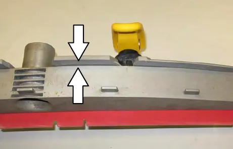 Inner frame seated on the outer frame, with arrows showing it pressed tight against the top