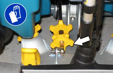 Rear squeegee with an arrow pointing to the tilt lock knob; gloves must be worn