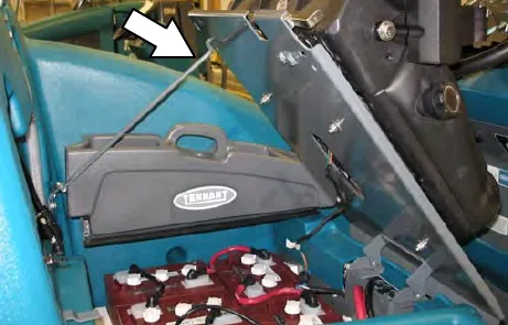 Seat held open by the seat support arm, with the battery compartment below