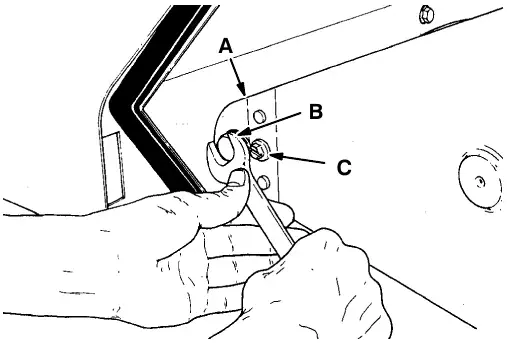 Removing the brush idler arm: brush idler arm (A), arm retaining bolt (B) and plastic screw (C)