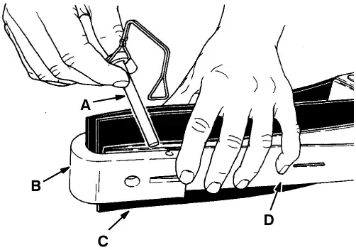 Removing retaining pins: retaining pin (A), end bracket (B), squeegee blade (C) and band (D)