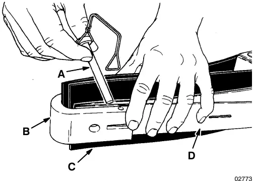 Removing retaining pins: retaining pin (A), end bracket (B), squeegee blade (C) and band (D)