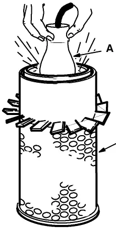 Inspecting the air filter element with a bright light: bright light (A) and filter element (B)