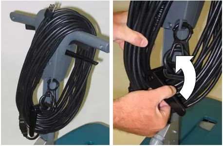 Power cord wrapped around the handle and cord hook, and the cord hook being turned upward to release the cord