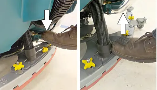 Stepping on the foot pedal to lower the squeegee assembly, and lifting it with the foot under the pedal