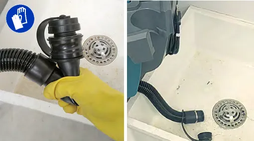 Pinching the recovery tank drain hose over a drain basin