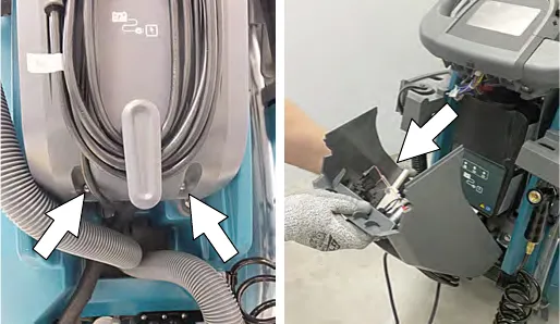 Removing the two screws at the bottom of the control console to reach the battery charger