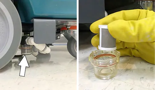 Solution tank filter located under the machine at the rear