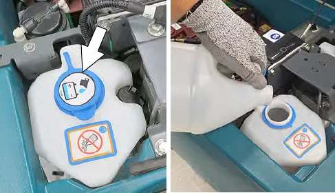 Automatic battery watering tank blue cap and refilling with distilled water