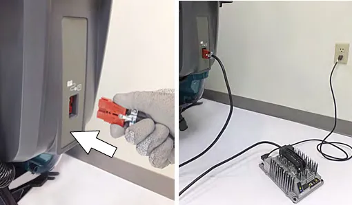 Off-board charger connected to the machine and plugged into a wall outlet