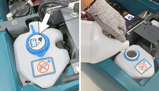 Adding distilled water to the automatic watering tank