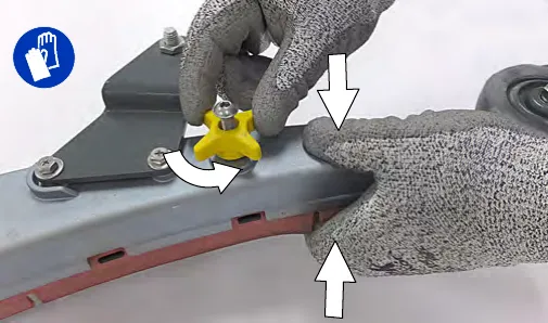 Loosening the two outside knobs on the T500 squeegee assembly